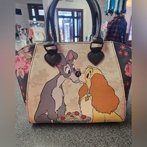 Disney Lady and the tramp purse also has shoulder strap a few flaws pictured